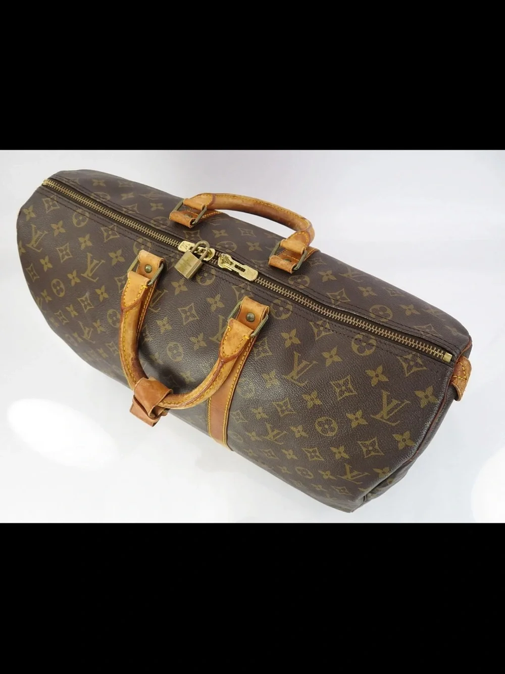 Louis Vuitton Monogram Canvas Keepall Duffel in Brown and Tan